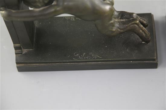 Paul Silvestre (French 1884-1976). A pair of early 20th century patinated bronze bookends, Susse Freres, Paris, length 8.25in.